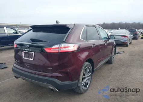 2021 Ford Edge Titanium z USA, uszkodzony, nr VIN 2FMPK4K95MBA38996